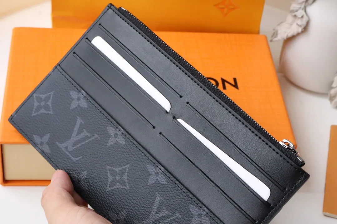 Factory price 240 M80348 black flower, top-quality original Slim Purse uses Monogram canvas and silky cowhide to achieve a simple structure, embellished with Louis Vuitton logo embossing, equipped with a main zipper compartment, external patch pockets, external compartments and card slots, and can also be placed in other handbags. Detailed features 20 x 11 x 0.5 cm (length x height x width) sp001618