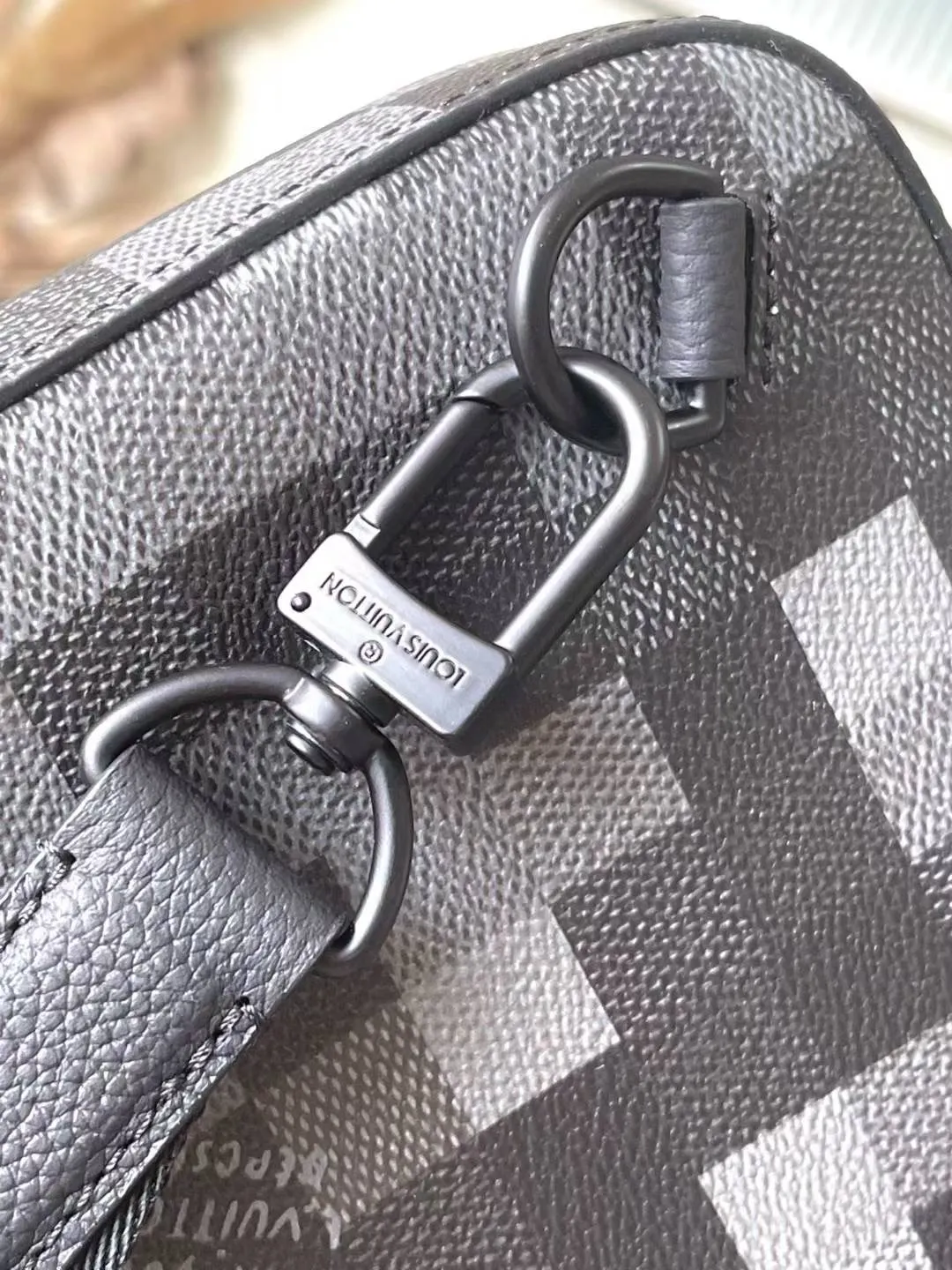 💰900 Top Original M14953 Damoflage black coated canvas adds a contemporary feel to the Avenue Slingbag's modern silhouette. A pixelated checkerboard pattern of grays and blacks is paired with matte black hardware for a masculine look. The Avenue features a main compartment and two zippered pockets for added functionality. The single shoulder strap is adjustable for comfortable cross-body wear. Appearance may vary slightly depending on pattern placement. Size: 16*5.7*33cm