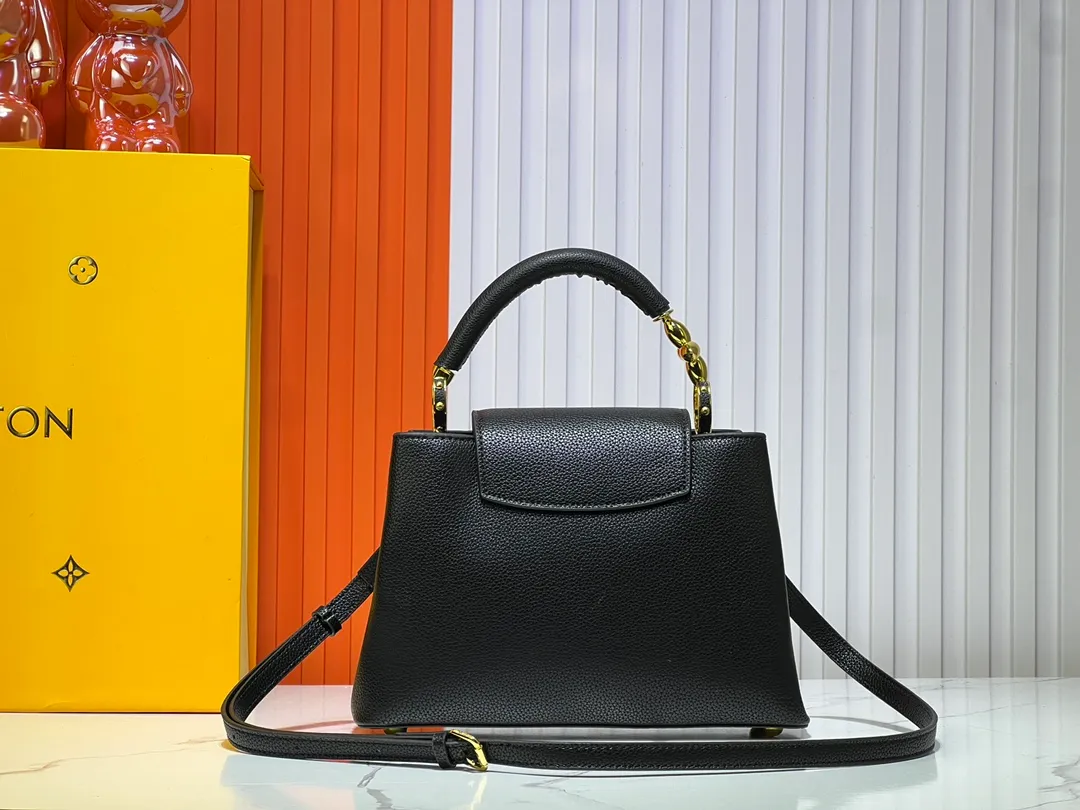 Batch 380💰Upgraded original M23943 M23944 M23945 M24698 M24989 This Capucines mini handbag incorporates exquisite Monogram flowers on the handle, presenting the three-dimensional look of the LV logo with delicate brushstrokes, injecting dazzling luster into the soft design. Full-grain Taurillon leather is designed to fit a smartphone, short wallet and other small essentials. Dimensions: Small 21.0 x 14.0 x 8.0 cm (L x H x W) Large 27x 17.5 x 9.0 cm (L x H x W)