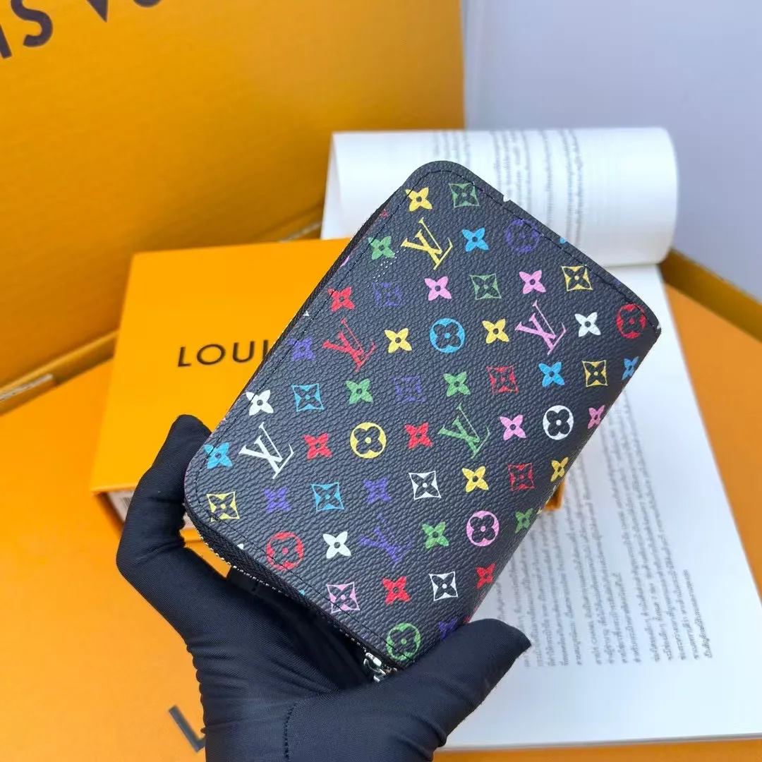 P150 M83689 33 colors This Cléa wallet is made of Monogram Empreinte soft grained cowhide, embellished with Louis Vuitton's iconic Monogram embossed pattern. It has a stylish design, is exquisite and compact but has a spacious capacity. It is equipped with an external patch pocket, zipper coin pocket, banknote compartment and six credit card slots.