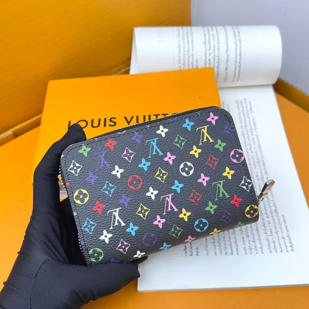 P150 M83689 33 colors This Cléa wallet is made of Monogram Empreinte soft grained cowhide, embellished with Louis Vuitton's iconic Monogram embossed pattern. It has a stylish design, is exquisite and compact but has a spacious capacity. It is equipped with an external patch pocket, zipper coin pocket, banknote compartment and six credit card slots.