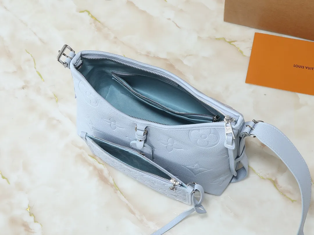 💰240💰Upgraded from the original M24141 M46288 M46293 M46277 M46298 M46203 CarryAll small handbag is made of Mono gram Empreinte embossed leather. It has a generous structure and a neat inner layer. The large inner bag adds functional elements. Comes with a Monogram embossed zipper clutch secured by a leather strap. A personal companion for urban life. Dimensions 29 x 24 x 12 cm (length x height x width)