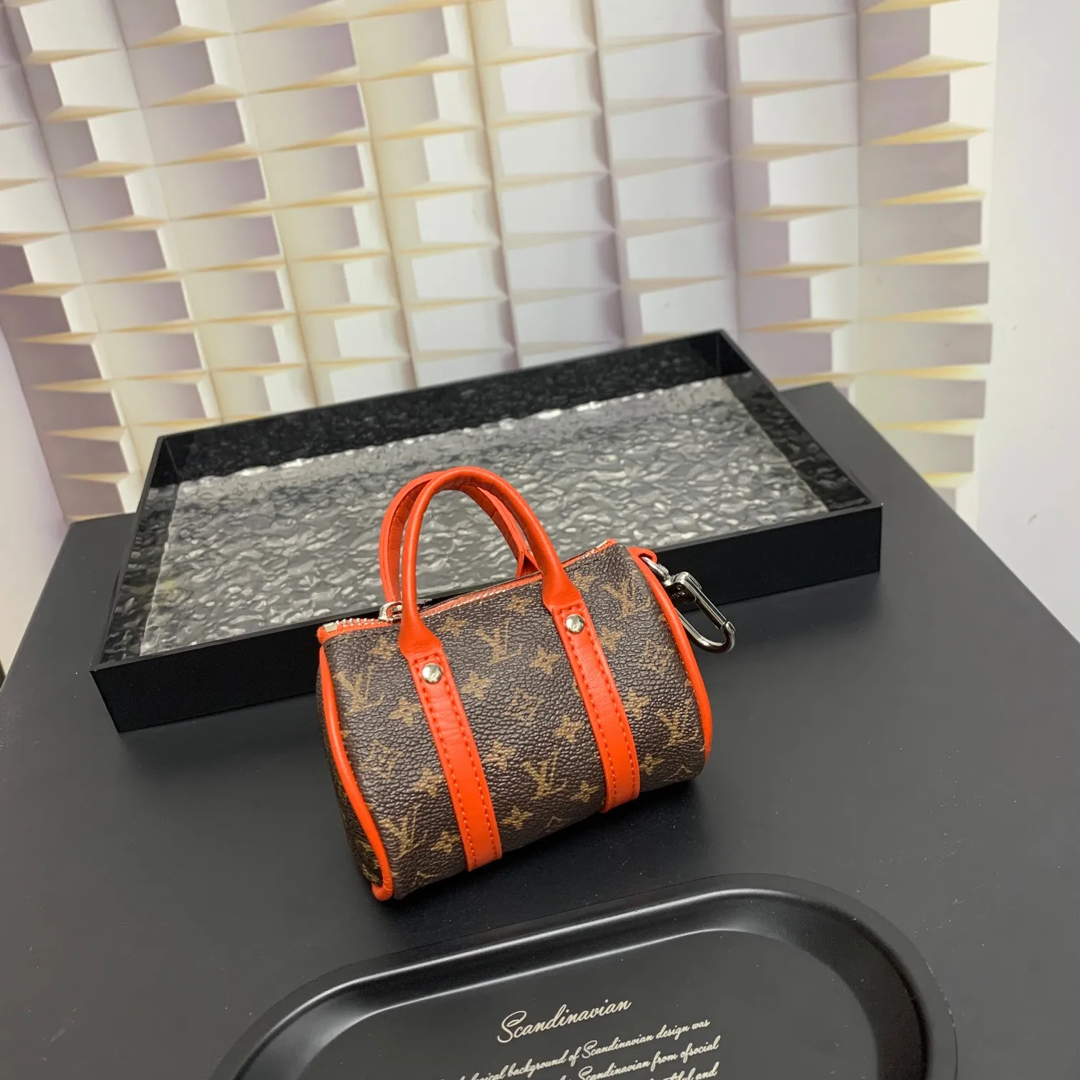 💰200 shipped😍 MINI KEEPALL bag charm and keychain ☀️Louis Vuitton Louis Vuitton lv mini pillow bag pendant ☀️This Mini Keepall bag charm and keychain condenses the classic handbag configuration, boldly showing the spirit of adventure. Monogram canvas with LV inscribed hook buckle, whether hung on a belt or handbag, its zipper closure and built-in keychain ensure secure storage