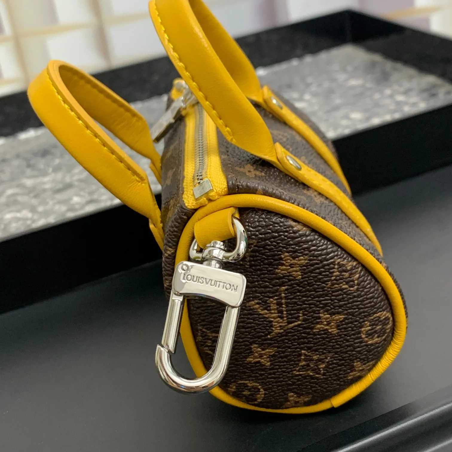 💰200 shipped😍 MINI KEEPALL bag charm and keychain ☀️Louis Vuitton Louis Vuitton lv mini pillow bag pendant ☀️This Mini Keepall bag charm and keychain condenses the classic handbag configuration, boldly showing the spirit of adventure. Monogram canvas with LV inscribed hook buckle, whether hung on a belt or handbag, its zipper closure and built-in keychain ensure secure storage