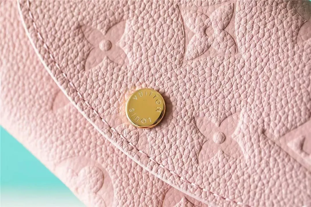 Factory price 280 [Top original order] M81455 pink first-layer cowhide👏👏This Rosalie coin purse is made of Monogram Empreinte embossed soft-grained cowhide. It opens with a round flip cover and has a compact configuration. It has a zippered coin pocket, a patch pocket and a card compartment inside. Louis Vuitton logo-engraved snaps secure the closure. Size: 11X8X2.5cm.