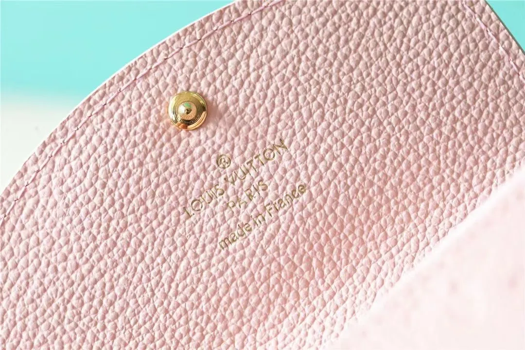 Factory price 280 [Top original order] M81455 pink first-layer cowhide👏👏This Rosalie coin purse is made of Monogram Empreinte embossed soft-grained cowhide. It opens with a round flip cover and has a compact configuration. It has a zippered coin pocket, a patch pocket and a card compartment inside. Louis Vuitton logo-engraved snaps secure the closure. Size: 11X8X2.5cm.