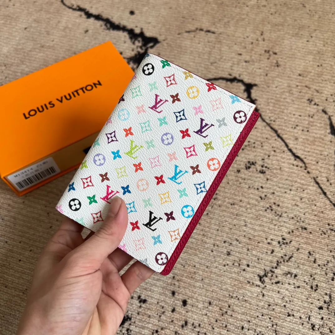 Factory Price 280 Top Original LV x TM Passport Case M13414 White Color (White Color Black Color-Takashi Murakami) This passport cover is lined with coated canvas and cow leather, and the Monogram pattern is updated with the rainbow tones of artist Takashi Murakami, which expresses the smart style of the Louis Vuitton x Murakami collaboration series. Card compartments and multiple pockets add functional details. Dimensions: 14 x 2.5 x 10 cm