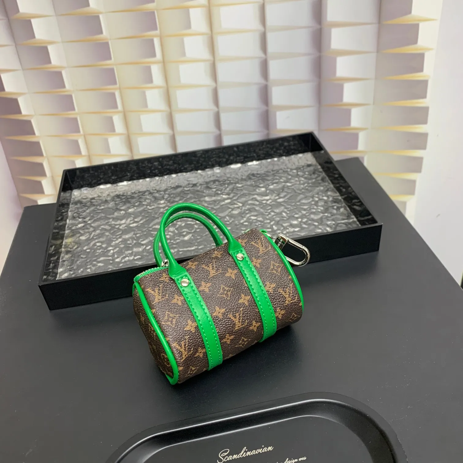 💰200 shipped😍 MINI KEEPALL bag charm and keychain ☀️Louis Vuitton Louis Vuitton lv mini pillow bag pendant ☀️This Mini Keepall bag charm and keychain condenses the classic handbag configuration, boldly showing the spirit of adventure. Monogram canvas with LV inscribed hook buckle, whether hung on a belt or handbag, its zipper closure and built-in keychain ensure secure storage