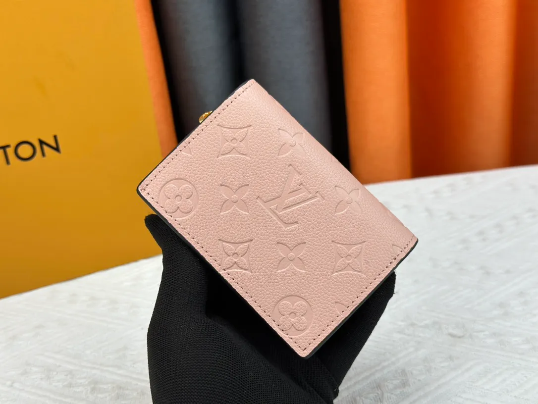 P150LV top replica M80152 This Cléa wallet is made of Monogram Empreinte soft grained cowhide, embellished with Louis Vuitton's iconic Monogram embossed pattern. It has a stylish design, is exquisite and compact but has a spacious capacity. It is equipped with an external patch pocket, zipper coin pocket, banknote compartment and six credit card slots. Dimensions: 12 x 9 x 3.5 cm (length x height x width