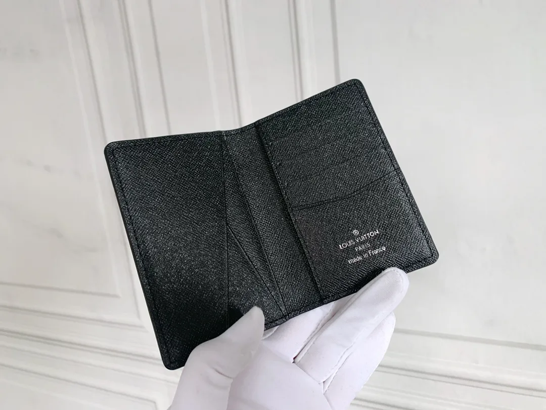 💰80 💎Small card holder Louis vuitton's pocket leather wallet has seven compartments, which can hold credit cards, bus cards, business cards, and even city maps. Damier canvas, leather-bound - two credit card compartments - four inner compartments - one outer compartment. ❤️ Model M63144 Size 7X11.