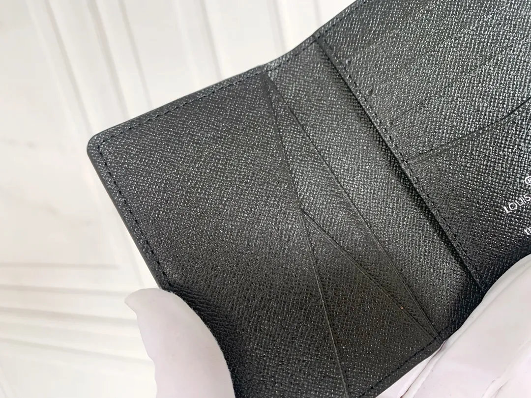 💰80 💎Small card holder Louis vuitton's pocket leather wallet has seven compartments, which can hold credit cards, bus cards, business cards, and even city maps. Damier canvas, leather-bound - two credit card compartments - four inner compartments - one outer compartment. ❤️ Model M63144 Size 7X11.