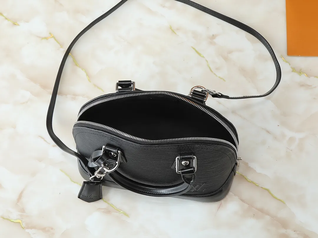 💰240💰Upgraded original M41160 M41327 M40855 M40862 M53152 This Alma BB handbag is based on a classic Louis Vuitton bag designed in 1934 with an Art Deco style. In 2010, on the occasion of the 20th anniversary of the official launch of the Alma bag, a mini model was specially designed for the daughter of the woman who owns this bag. The Alma BB bag features a removable shoulder strap for lightweight cross-body wear. A new and stylish take on a classic shape, this bag in Epi leather is available in a range of bright, vibrant colors. Size: 25×19×12cm