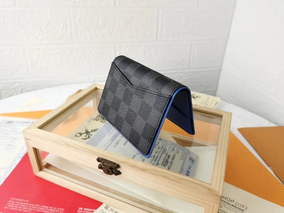 P110💰Top Original💎N63144 black check with yellow, this pocket wallet combines the elegance of Damier Graphite canvas with the delicate texture of Epi leather, with stripes emblazoned with the Louis Vuitton logo. The elegant design can accommodate credit cards, banknotes and receipts, making it suitable for daily carrying or gift giving. Detailed Features 8.0 x 11.0 x 1.0 cm (L x H x W) Epi leather and Damier Graphite coated canvas Coated cowhide leather trim Cowhide lining, card compartment, inner pocket, outer patch pocket This product is made in one of France, Spain, Italy and the United States