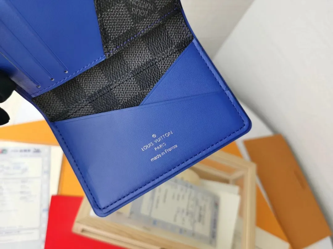 P110💰Top Original💎N63144 black check with yellow, this pocket wallet combines the elegance of Damier Graphite canvas with the delicate texture of Epi leather, with stripes emblazoned with the Louis Vuitton logo. The elegant design can accommodate credit cards, banknotes and receipts, making it suitable for daily carrying or gift giving. Detailed Features 8.0 x 11.0 x 1.0 cm (L x H x W) Epi leather and Damier Graphite coated canvas Coated cowhide leather trim Cowhide lining, card compartment, inner pocket, outer patch pocket This product is made in one of France, Spain, Italy and the United States