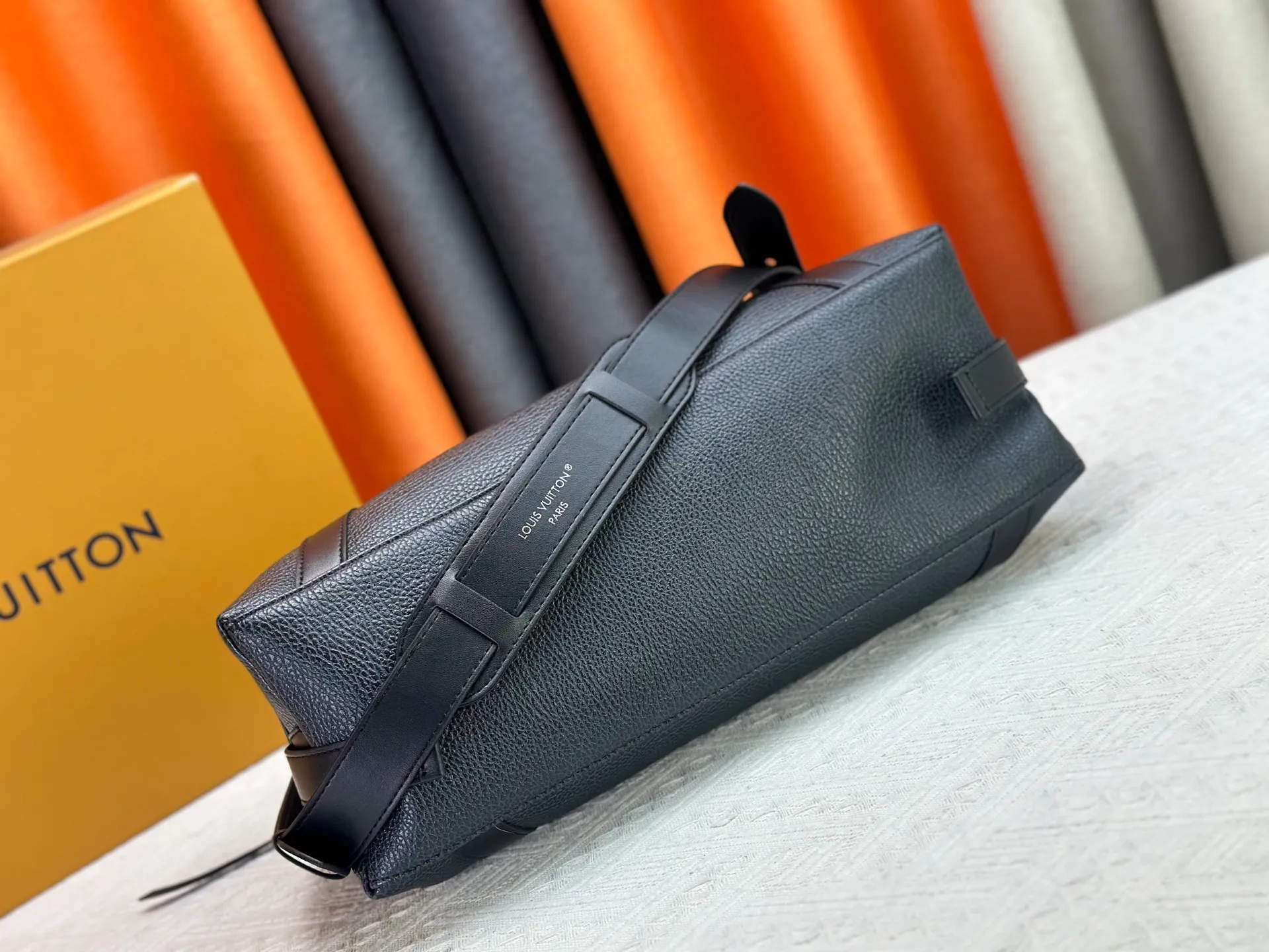 P300 small P320 medium P340 large M25557 M25561 M25561 M25566 Black M14623 mini M14514 small M14700 medium Dark gray M14702 medium Light gray M14721 small This Nano LV Rider handbag is from 2025 For the spring and summer series, pixelated grained sheep leather is blended with smooth cow leather elements, and the LV Circle logo is highlighted with elegant patches. The foldable configuration makes it easy to store in a suitcase, and the modern design adds a rock-n-roll edge to any look.  Mini 10 x 10 x 23 cm Small 12 × 12 × 30 cm Medium 15 × 15 × 38 cm (H x W x L) Sheep leather Cow leather trim Textile lining Metal hardware Zipper closure Side slip straps Internal pocket Holds a 6.7-inch smartphone, Romy card holder and lipstick Shoulder strap: removable, adjustable Strap half-length: 30.0 cm Bag strap half length adjustable to: 45.0 cm Handle: double handle