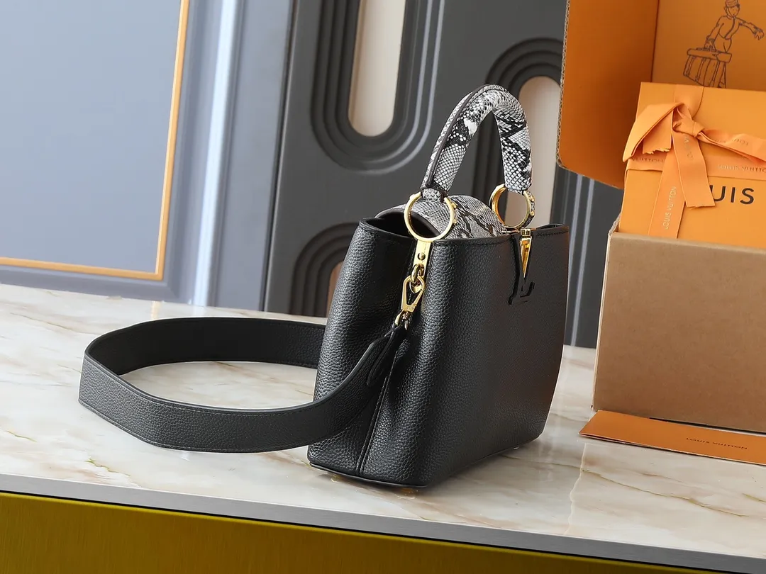 💰340💰Guangzhou goods Upgraded original M80071 M80041 M81410 M81258 M98477 This Capucines handbag displays the subtle sheen of the delicate Taurillon leather and python leather handles, embellished with iconic letters. The detachable wide shoulder strap allows the compact size to be worn on the shoulder or cross-body. Dimensions: 27.0 x 17.3 x 9.0 cm