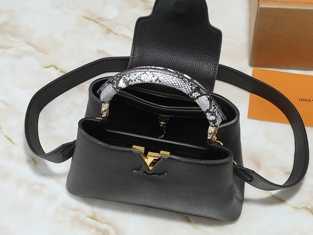 💰340💰Guangzhou goods Upgraded original M80071 M80041 M81410 M81258 M98477 This Capucines handbag displays the subtle sheen of the delicate Taurillon leather and python leather handles, embellished with iconic letters. The detachable wide shoulder strap allows the compact size to be worn on the shoulder or cross-body. Dimensions: 27.0 x 17.3 x 9.0 cm