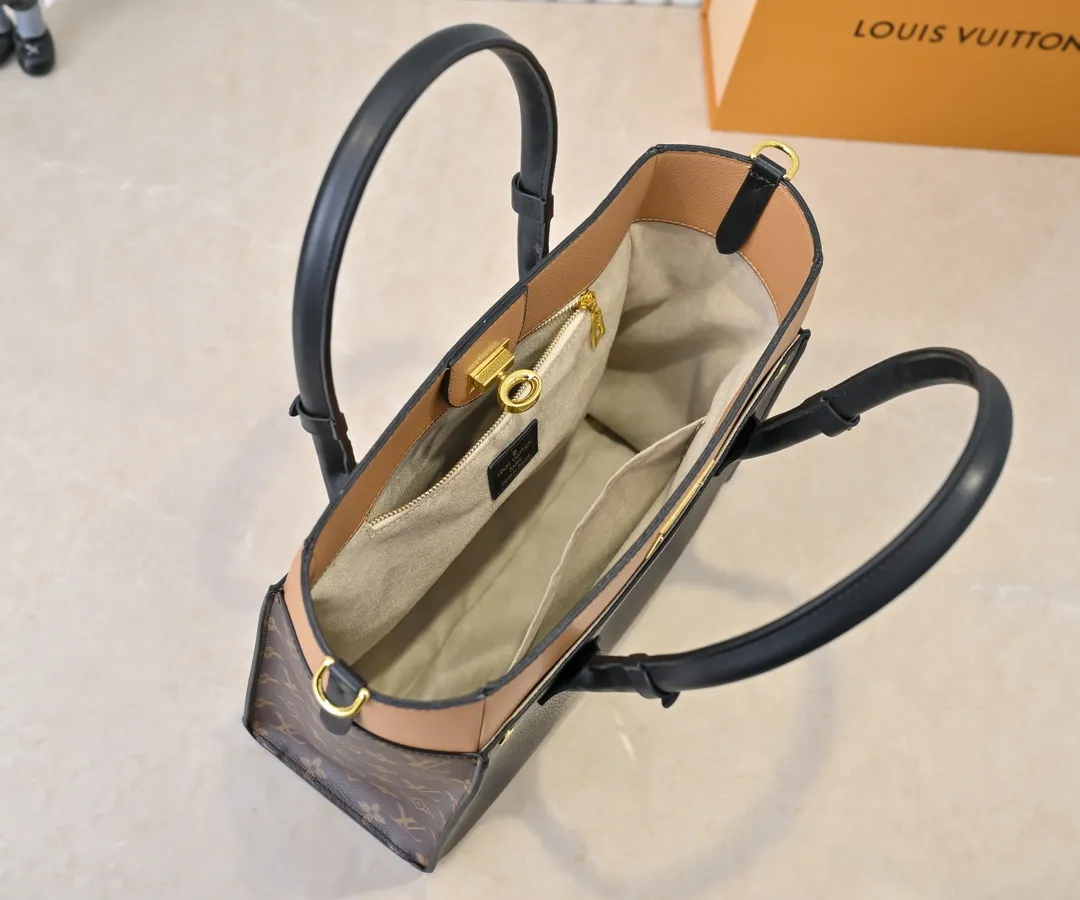 💰360💰Upgraded original [M53826 black embroidery M53825 apricot embroidery M53824 MM53823 presbyopia with black]🔥On My Side handbag shows the elegant fusion of calfskin and classic Monogram canvas. Contrasting canvas shapes the large outer pocket, creating a trompe l'oeil effect as if two handbags merge into one. Plenty of space can easily accommodate office needs, and the adjustable shoulder strap allows for a cross-body style. Dimensions: 30.5 x 24.5 x 14 cm (Length x Height x Width) - Calfskin and Monogram coated canvas - Cowhide leather trim - Microfiber lining - 2 top handles for hand or elbow carry - Adjustable shoulder strap for shoulder or cross-body wear - Lock closure - 2 outer pockets with magnetic closure - Zip pocket - 1 patch pocket