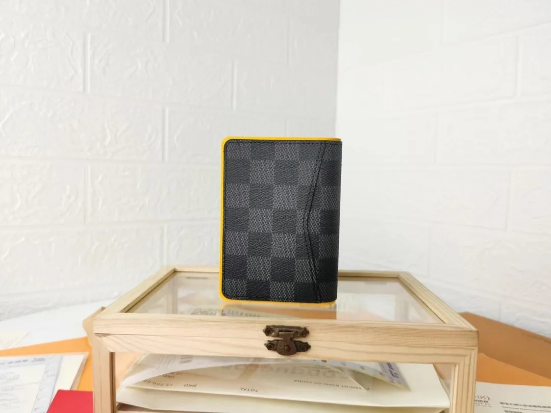 P110💰Top Original💎N63144 black check with yellow, this pocket wallet combines the elegance of Damier Graphite canvas with the delicate texture of Epi leather, with stripes emblazoned with the Louis Vuitton logo. The elegant design can accommodate credit cards, banknotes and receipts, making it suitable for daily carrying or gift giving. Detailed Features 8.0 x 11.0 x 1.0 cm (L x H x W) Epi leather and Damier Graphite coated canvas Coated cowhide leather trim Cowhide lining, card compartment, inner pocket, outer patch pocket This product is made in one of France, Spain, Italy and the United States