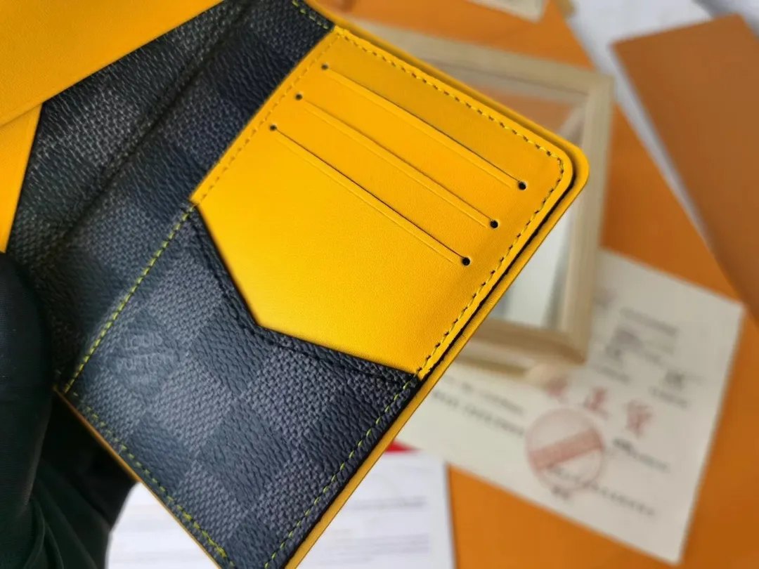 P110💰Top Original💎N63144 black check with yellow, this pocket wallet combines the elegance of Damier Graphite canvas with the delicate texture of Epi leather, with stripes emblazoned with the Louis Vuitton logo. The elegant design can accommodate credit cards, banknotes and receipts, making it suitable for daily carrying or gift giving. Detailed Features 8.0 x 11.0 x 1.0 cm (L x H x W) Epi leather and Damier Graphite coated canvas Coated cowhide leather trim Cowhide lining, card compartment, inner pocket, outer patch pocket This product is made in one of France, Spain, Italy and the United States