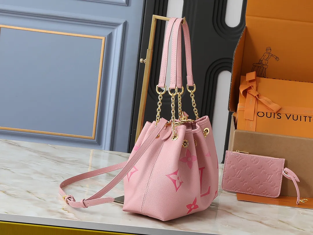 💰260💰Upgraded original version ✨M11283 M25453 M47209 M46545 M46492 This Summer Bundle handbag is from the Dégradé series. The new drawstring design adds a summer atmosphere. The Monogram Empreinte embossed leather bag features a gradient tone to brighten any seasonal look. The double handles and detachable cross-body strap provide a variety of stylish carrying options, making it a great companion for travel day and night. Detailed features: 28 x 20 x 11.5 (Length x Height x Width)