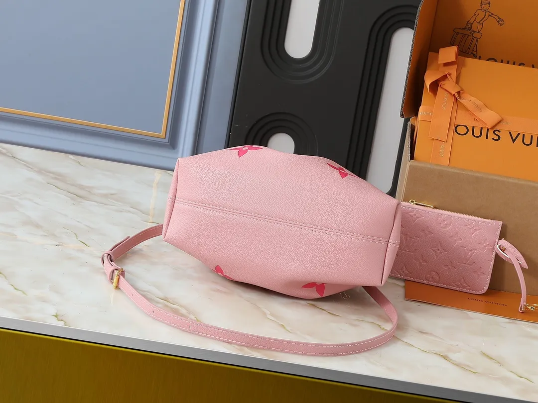 💰260💰Upgraded original version ✨M11283 M25453 M47209 M46545 M46492 This Summer Bundle handbag is from the Dégradé series. The new drawstring design adds a summer atmosphere. The Monogram Empreinte embossed leather bag features a gradient tone to brighten any seasonal look. The double handles and detachable cross-body strap provide a variety of stylish carrying options, making it a great companion for travel day and night. Detailed features: 28 x 20 x 11.5 (Length x Height x Width)