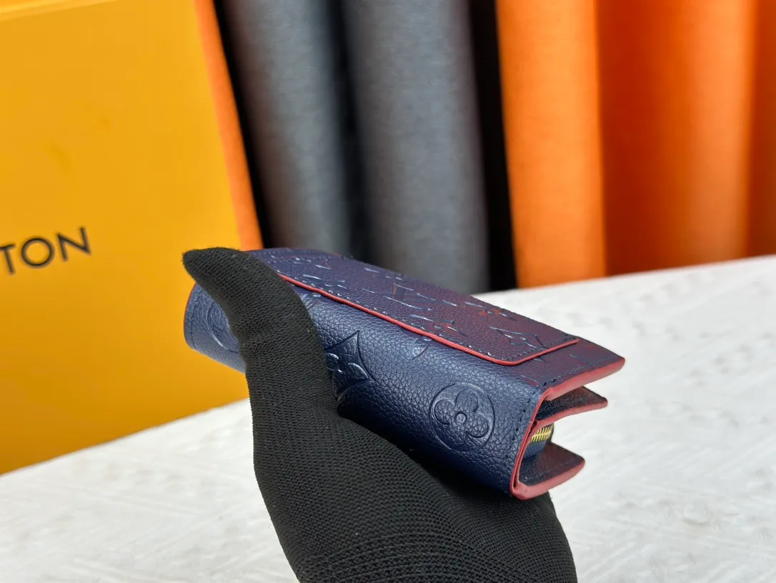 P150LV top replica M80152 This Cléa wallet is made of Monogram Empreinte soft grained cowhide, embellished with Louis Vuitton's iconic Monogram embossed pattern. It has a stylish design, is exquisite and compact but has a spacious capacity. It is equipped with an external patch pocket, zipper coin pocket, banknote compartment and six credit card slots. Dimensions: 12 x 9 x 3.5 cm (length x height x width