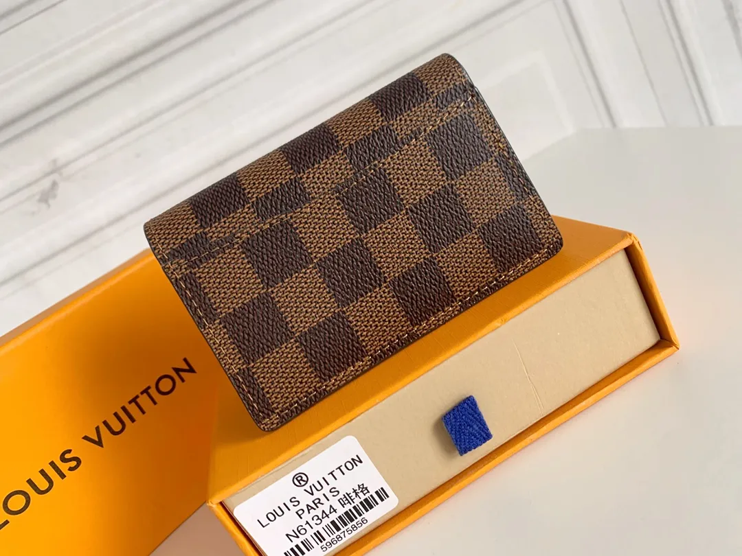 💰80 💎Small card holder Louis vuitton's pocket leather wallet has seven compartments, which can hold credit cards, bus cards, business cards, and even city maps. Damier canvas, leather-bound - two credit card compartments - four inner compartments - one outer compartment. ❤️ Model M63144 Size 7X11.