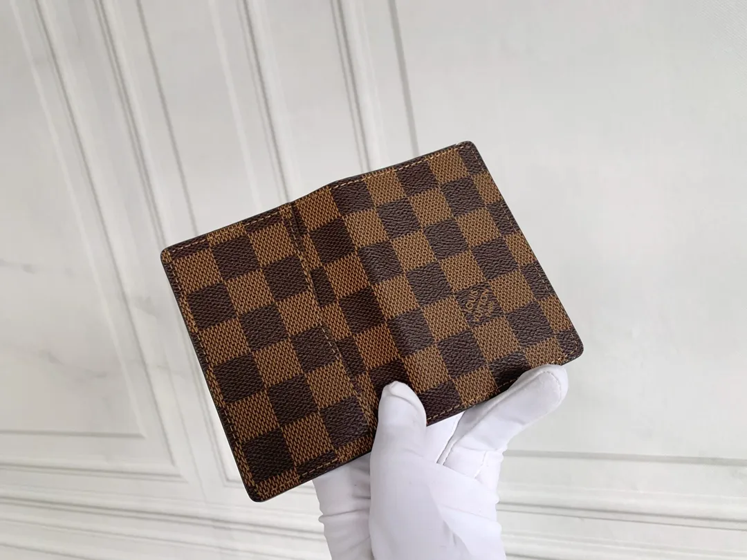 💰80 💎Small card holder Louis vuitton's pocket leather wallet has seven compartments, which can hold credit cards, bus cards, business cards, and even city maps. Damier canvas, leather-bound - two credit card compartments - four inner compartments - one outer compartment. ❤️ Model M63144 Size 7X11.