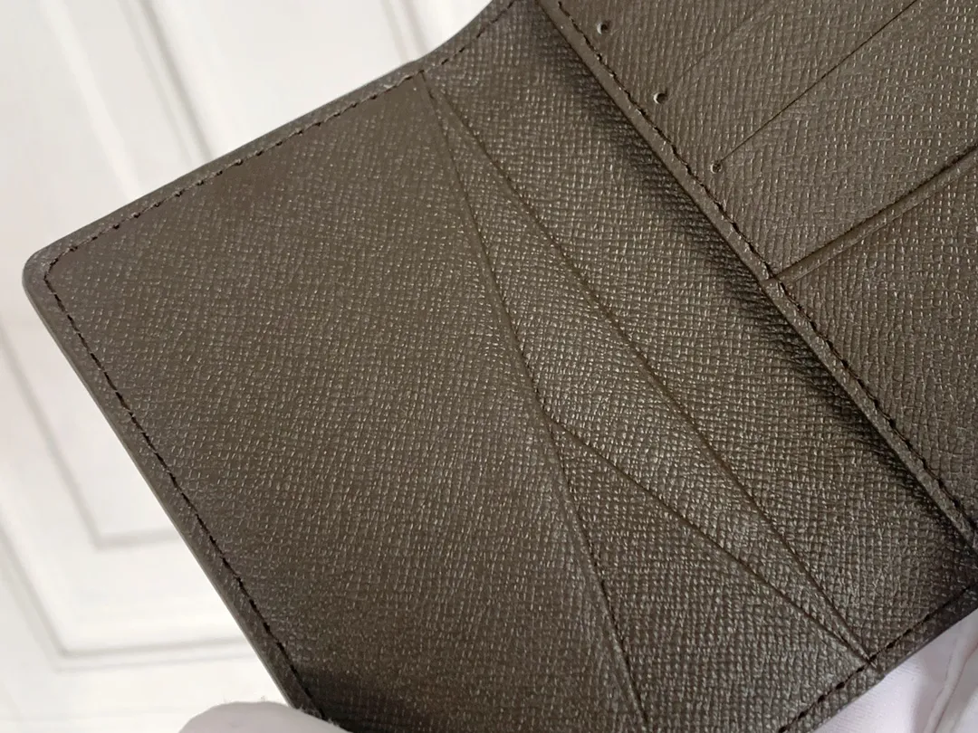 💰80 💎Small card holder Louis vuitton's pocket leather wallet has seven compartments, which can hold credit cards, bus cards, business cards, and even city maps. Damier canvas, leather-bound - two credit card compartments - four inner compartments - one outer compartment. ❤️ Model M63144 Size 7X11.