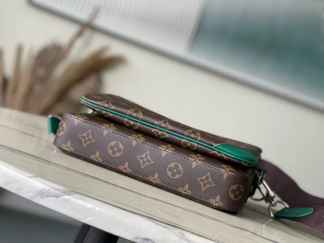 💰800 Top Original Order M12766 This Trio messenger bag is made of Monogram Macassar coated canvas, and then uses bright cow leather to outline the edges and other details. The main compartment and removable zippered front pocket provide storage, and the removable small coin purse secures via the shoulder strap's D-ring. Dimensions: 25 × 18.5 × 7cm