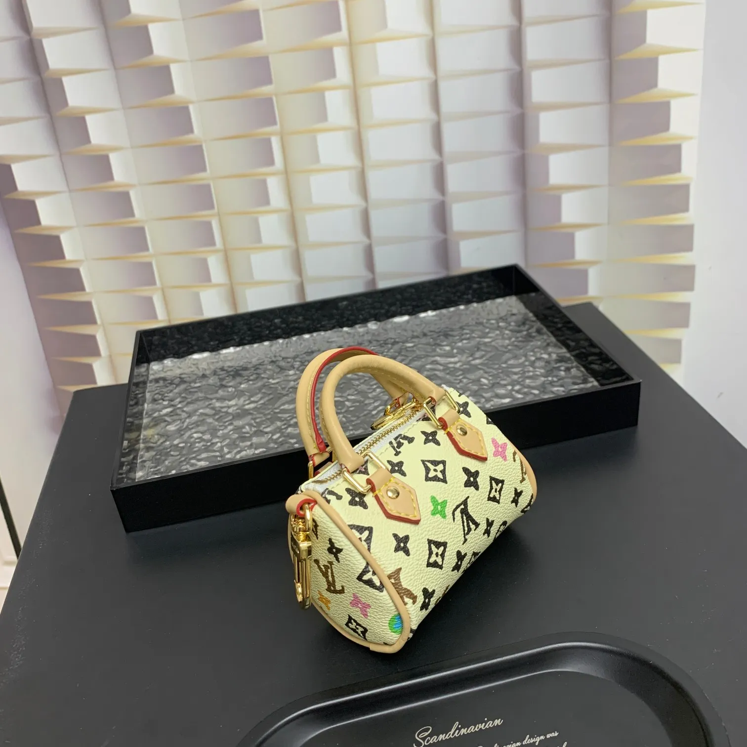 💰200 shipped😍 MINI KEEPALL bag charm and keychain ☀️Louis Vuitton Louis Vuitton lv mini pillow bag pendant ☀️This Mini Keepall bag charm and keychain condenses the classic handbag configuration, boldly showing the spirit of adventure. Monogram canvas with LV inscribed hook buckle, whether hung on a belt or handbag, its zipper closure and built-in keychain ensure secure storage
