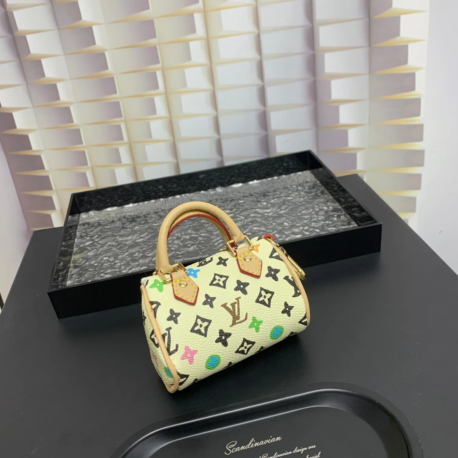 💰200 shipped😍 MINI KEEPALL bag charm and keychain ☀️Louis Vuitton Louis Vuitton lv mini pillow bag pendant ☀️This Mini Keepall bag charm and keychain condenses the classic handbag configuration, boldly showing the spirit of adventure. Monogram canvas with LV inscribed hook buckle, whether hung on a belt or handbag, its zipper closure and built-in keychain ensure secure storage