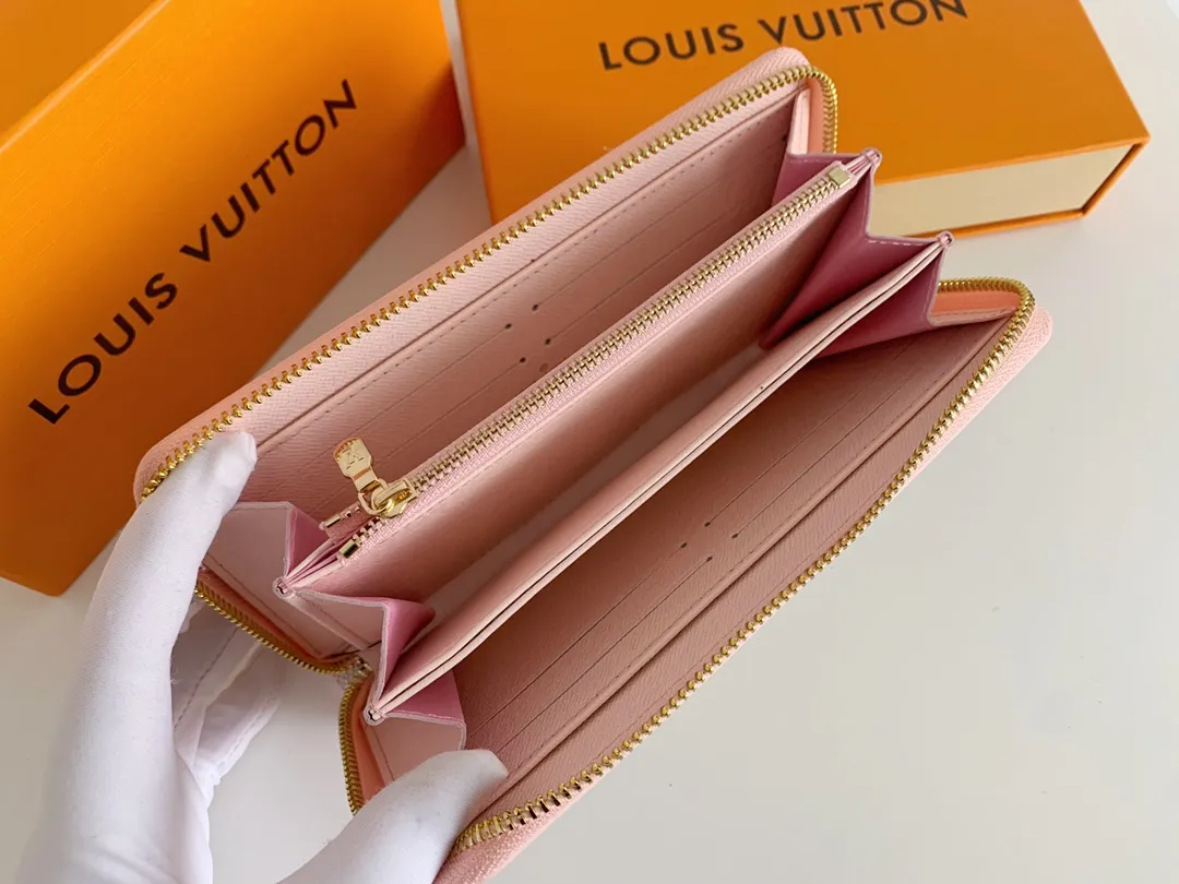 💰100 💎M60017 inner color ❤️white plaid pink ZIPPY zipper wallet. The Zippy wallet pays homage to Louis Vuitton's heritage of travel and trunk making, with a travel-style patch and Louis Vuitton logo. With its compact interior and simple design, this wallet is ideal for everyday use. Model M60017. Size: 19x10.