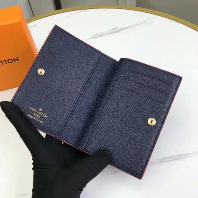 P150M80152 This Cléa wallet is made of Monogram Empreinte soft grained cowhide, embellished with Louis Vuitton's iconic Monogram embossed pattern. It has a stylish design, is exquisite and compact but has a spacious capacity. It is equipped with an external patch pocket, zipper coin pocket, banknote compartment and six credit card slots. Dimensions: 12 x 9 x 3.5 cm (length x height x width