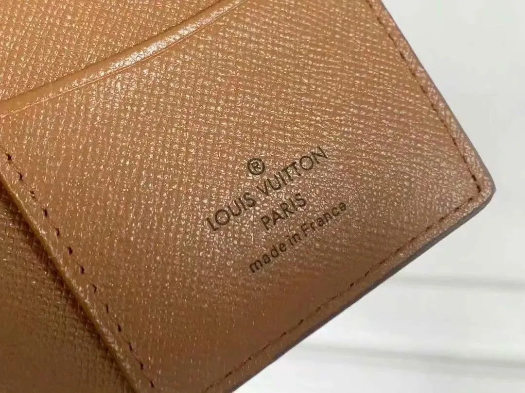 P90 Small Card Holder Louis Vuitton's pocket leather wallet has seven compartments, which can hold credit cards, bus cards, business cards, and even city maps. Damier canvas, leather-bound - two credit card compartments - four inner compartments - one outer compartment. Model M63144 Size 7X11.