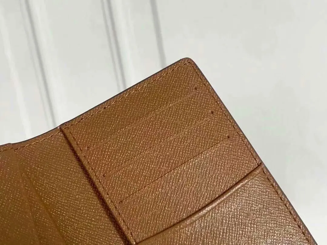 P90 Small Card Holder Louis Vuitton's pocket leather wallet has seven compartments, which can hold credit cards, bus cards, business cards, and even city maps. Damier canvas, leather-bound - two credit card compartments - four inner compartments - one outer compartment. Model M63144 Size 7X11.