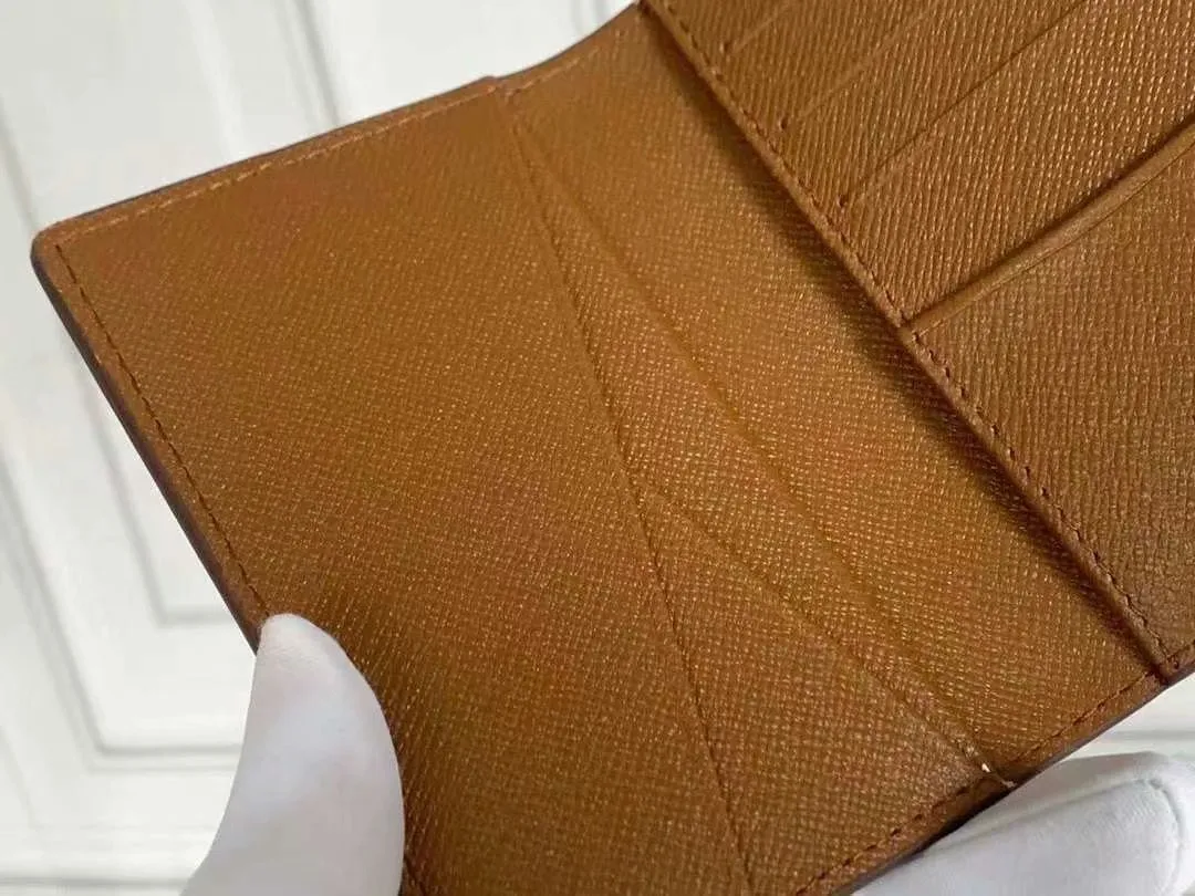 P90 Small Card Holder Louis Vuitton's pocket leather wallet has seven compartments, which can hold credit cards, bus cards, business cards, and even city maps. Damier canvas, leather-bound - two credit card compartments - four inner compartments - one outer compartment. Model M63144 Size 7X11.
