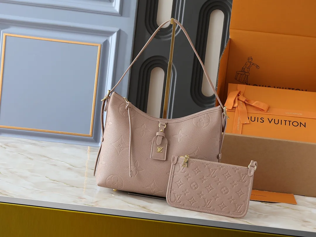 💰240💰Upgraded from the original M24141 M46288 M46293 M46277 M46298 M46203 CarryAll small handbag is made of Mono gram Empreinte embossed leather. It has a generous structure and a neat inner layer. The large inner bag adds functional elements. Comes with a Monogram embossed zipper clutch secured by a leather strap. A personal companion for urban life. Dimensions 29 x 24 x 12 cm (length x height x width)