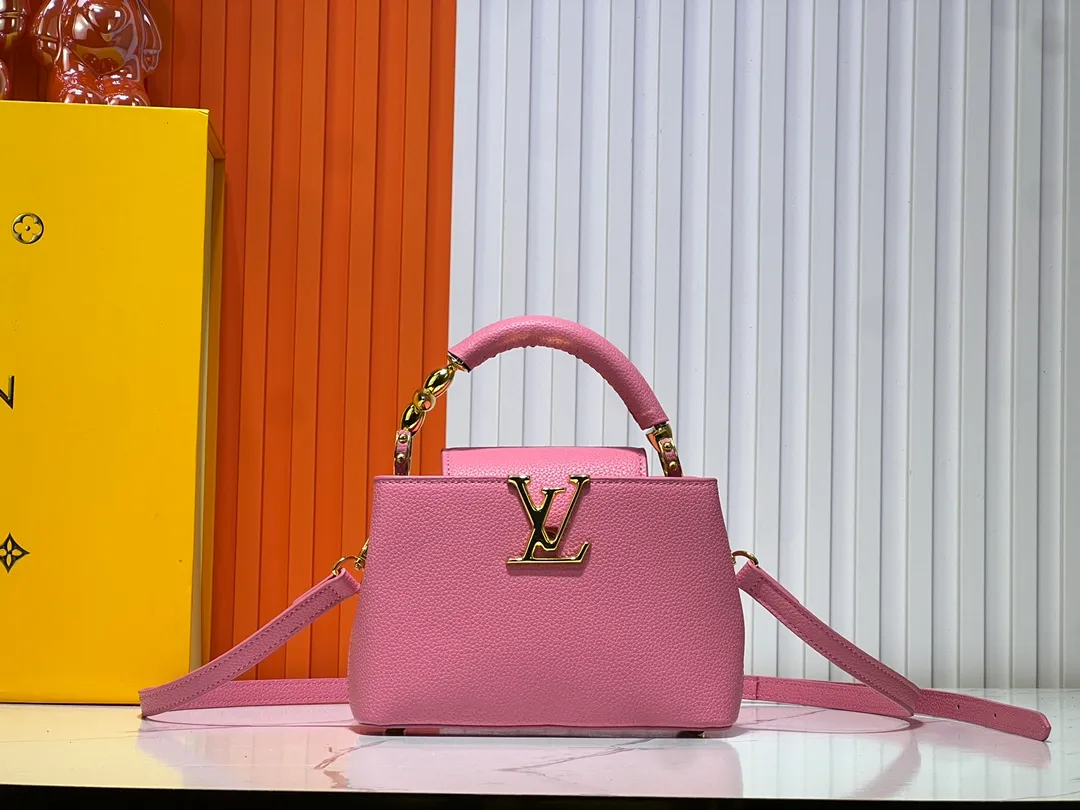 Batch 360💰Upgraded original M23943 M23944 M23945 M24698 M24989 This Capucines mini handbag incorporates exquisite Monogram flowers on the handle, presenting the three-dimensional look of the LV logo with delicate brushstrokes, injecting dazzling luster into the soft design. Full-grain Taurillon leather is designed to fit a smartphone, short wallet and other small essentials. Dimensions: Small 21.0 x 14.0 x 8.0 cm (L x H x W) Large 27x 17.5 x 9.0 cm (L x H x W)