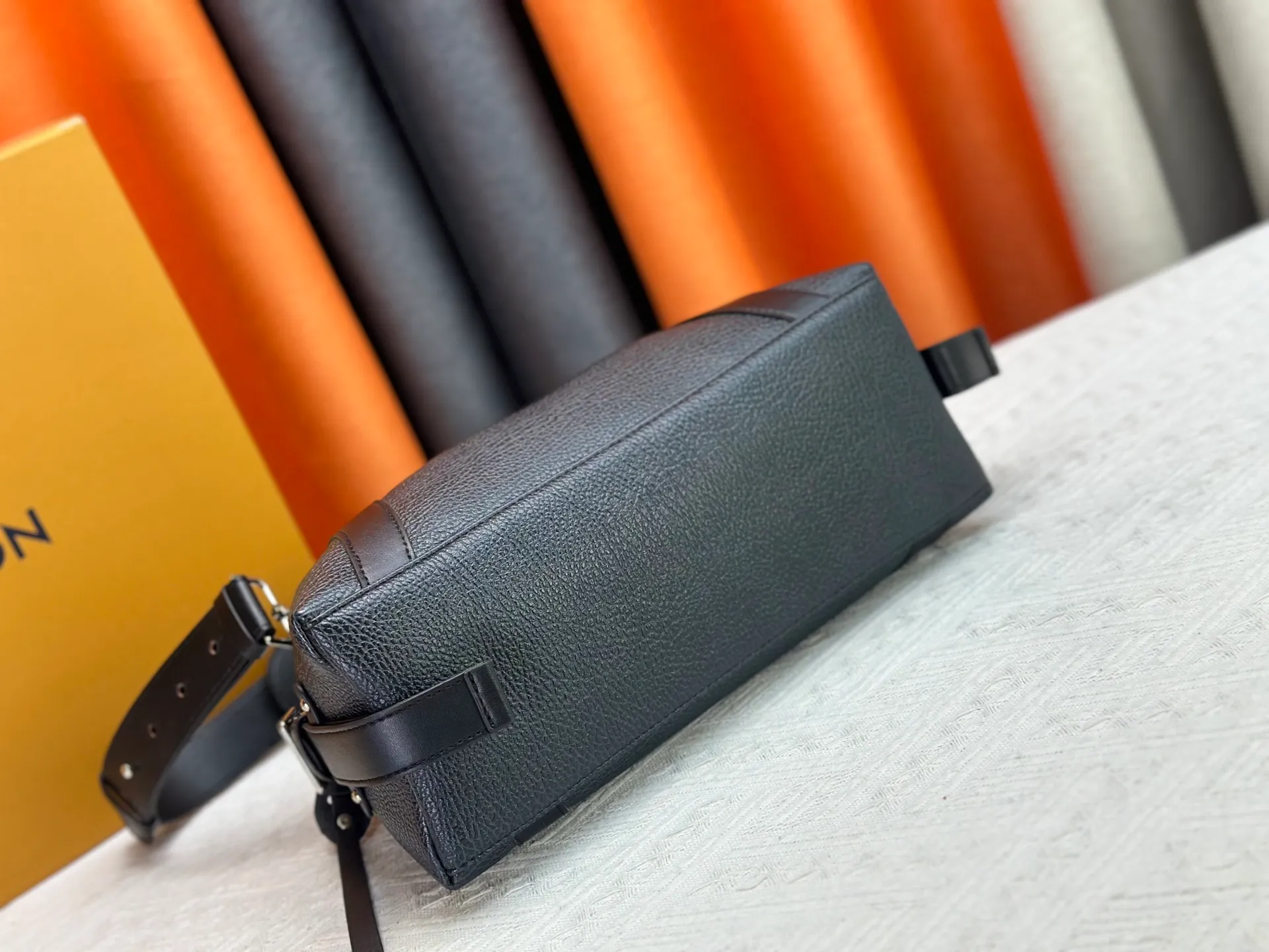 P300 small P320 medium P340 large M25557 M25561 M25561 M25566 Black M14623 mini M14514 small M14700 medium Dark gray M14702 medium Light gray M14721 small This Nano LV Rider handbag is from 2025 For the spring and summer series, pixelated grained sheep leather is blended with smooth cow leather elements, and the LV Circle logo is highlighted with elegant patches. The foldable configuration makes it easy to store in a suitcase, and the modern design adds a rock-n-roll edge to any look.  Mini 10 x 10 x 23 cm Small 12 × 12 × 30 cm Medium 15 × 15 × 38 cm (H x W x L) Sheep leather Cow leather trim Textile lining Metal hardware Zipper closure Side slip straps Internal pocket Holds a 6.7-inch smartphone, Romy card holder and lipstick Shoulder strap: removable, adjustable Strap half-length: 30.0 cm Bag strap half length adjustable to: 45.0 cm Handle: double handle