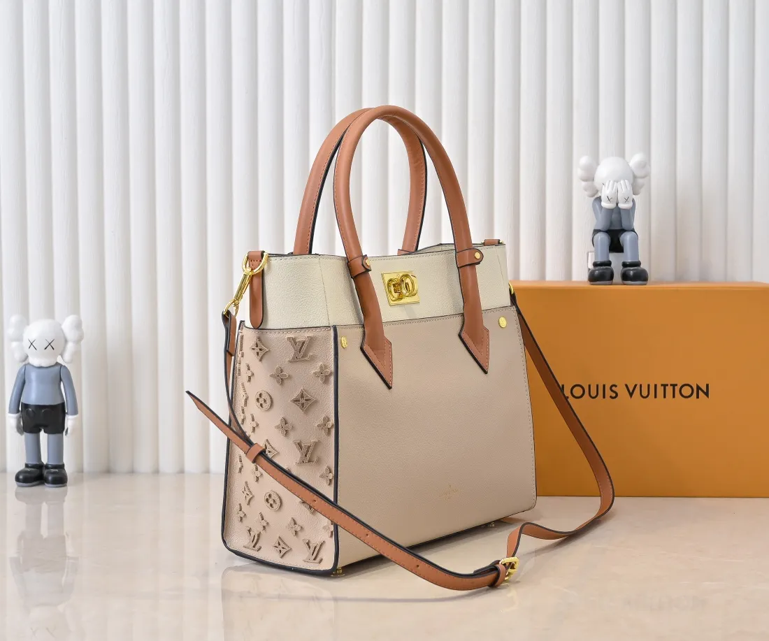 💰400💰Upgraded original [M53826 black embroidery M53825 apricot embroidery M53824 MM53823 presbyopia with black] 🔥On My Side handbag shows the elegant fusion of calfskin and classic Monogram canvas. Contrasting canvas shapes the large outer pocket, creating a trompe l'oeil effect as if two handbags merge into one. Plenty of space can easily accommodate office needs, and the adjustable shoulder strap allows for a cross-body style. Dimensions: 30.5 x 24.5 x 14 cm (Length x Height x Width) - Calfskin and Monogram coated canvas - Cowhide leather trim - Microfiber lining - 2 top handles for hand or elbow carry - Adjustable shoulder strap for shoulder or cross-body wear - Lock closure - 2 outer pockets with magnetic closure - Zip pocket - 1 patch pocket