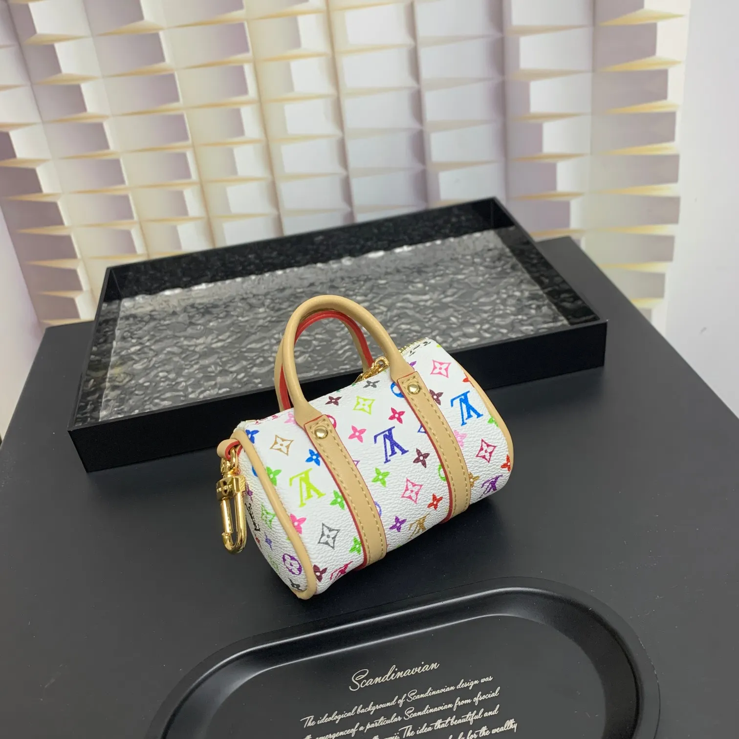 💰200 shipped😍 MINI KEEPALL bag charm and keychain ☀️Louis Vuitton Louis Vuitton lv mini pillow bag pendant ☀️This Mini Keepall bag charm and keychain condenses the classic handbag configuration, boldly showing the spirit of adventure. Monogram canvas with LV inscribed hook buckle, whether hung on a belt or handbag, its zipper closure and built-in keychain ensure secure storage