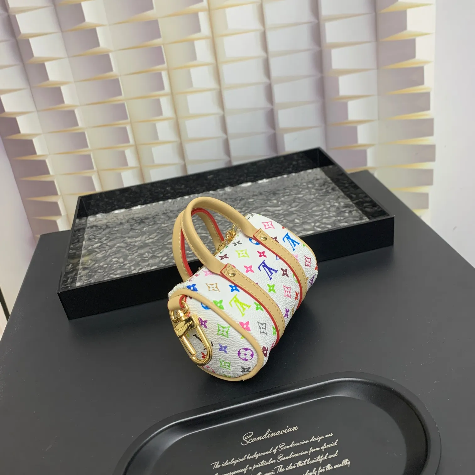 💰200 shipped😍 MINI KEEPALL bag charm and keychain ☀️Louis Vuitton Louis Vuitton lv mini pillow bag pendant ☀️This Mini Keepall bag charm and keychain condenses the classic handbag configuration, boldly showing the spirit of adventure. Monogram canvas with LV inscribed hook buckle, whether hung on a belt or handbag, its zipper closure and built-in keychain ensure secure storage