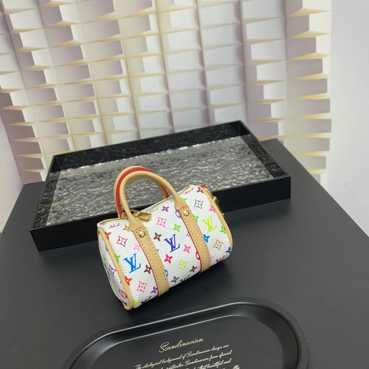 💰200 shipped😍 MINI KEEPALL bag charm and keychain ☀️Louis Vuitton Louis Vuitton lv mini pillow bag pendant ☀️This Mini Keepall bag charm and keychain condenses the classic handbag configuration, boldly showing the spirit of adventure. Monogram canvas with LV inscribed hook buckle, whether hung on a belt or handbag, its zipper closure and built-in keychain ensure secure storage