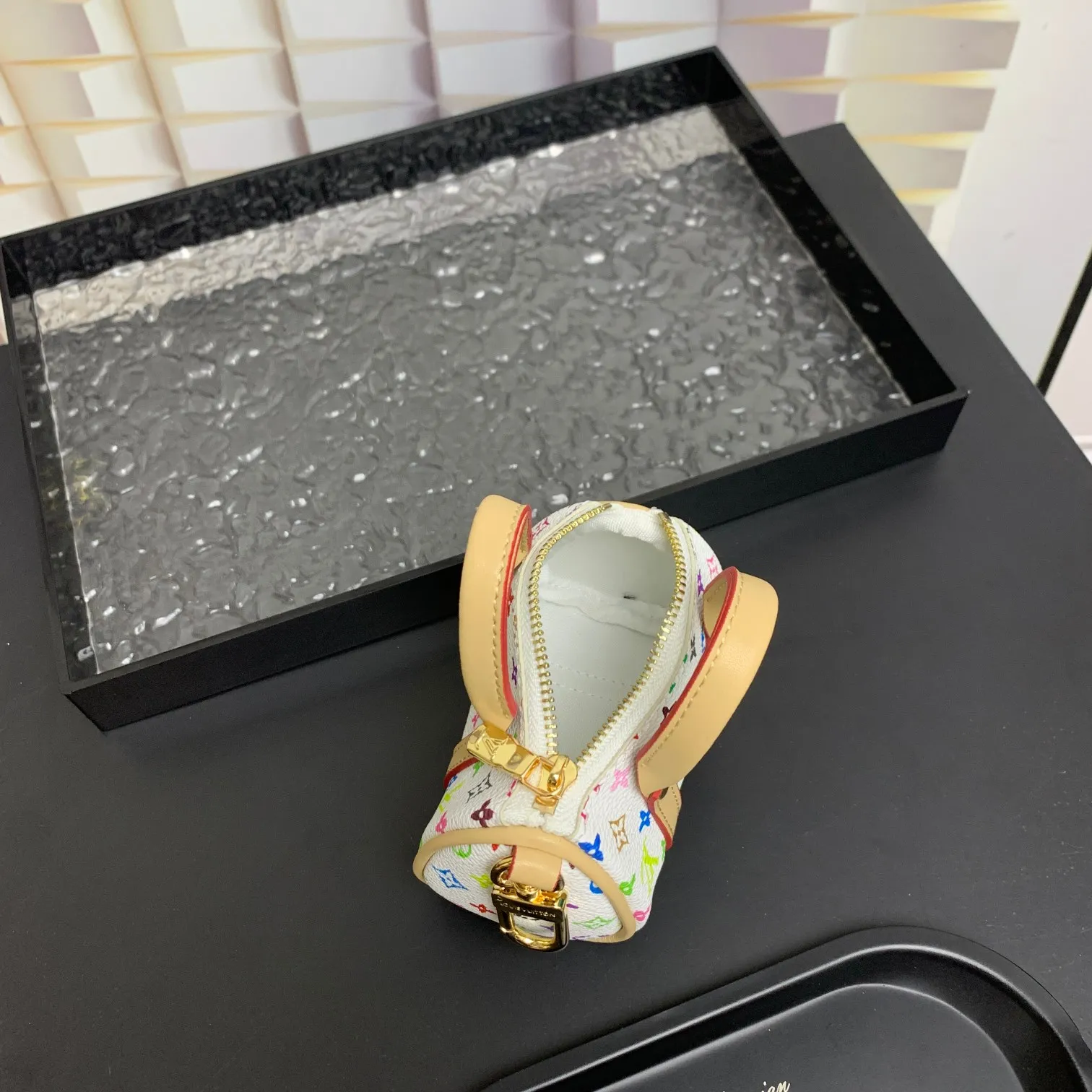 💰200 shipped😍 MINI KEEPALL bag charm and keychain ☀️Louis Vuitton Louis Vuitton lv mini pillow bag pendant ☀️This Mini Keepall bag charm and keychain condenses the classic handbag configuration, boldly showing the spirit of adventure. Monogram canvas with LV inscribed hook buckle, whether hung on a belt or handbag, its zipper closure and built-in keychain ensure secure storage