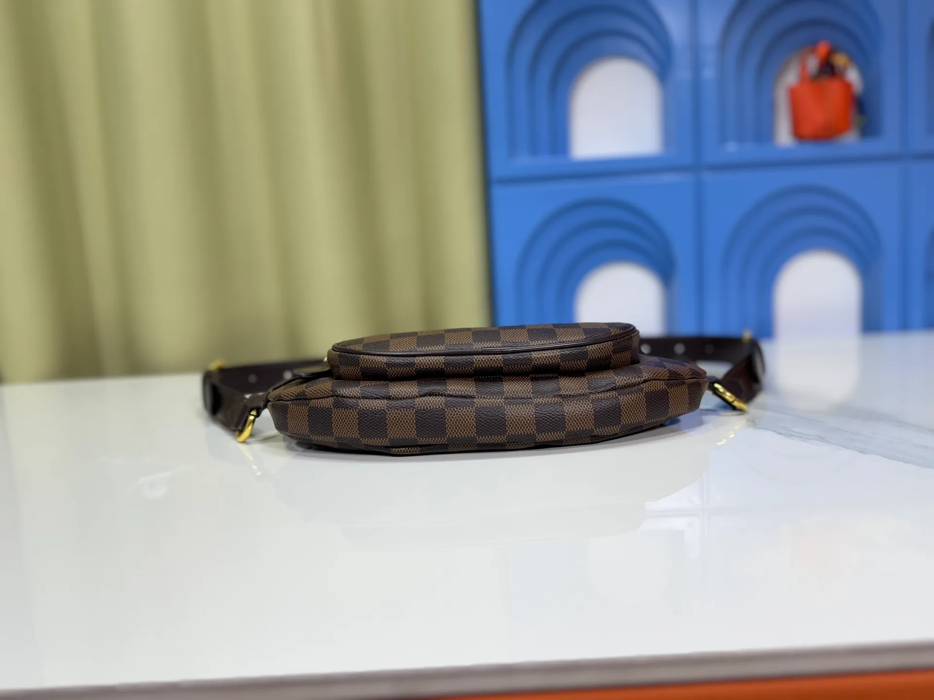 P220 upgraded original M14806 M00230 combines classic elements with new styles - checkerboard elements appear on dish-shaped waist bags and small square hand bags, which are both recognizable and fresh.  Size 28-13-3
