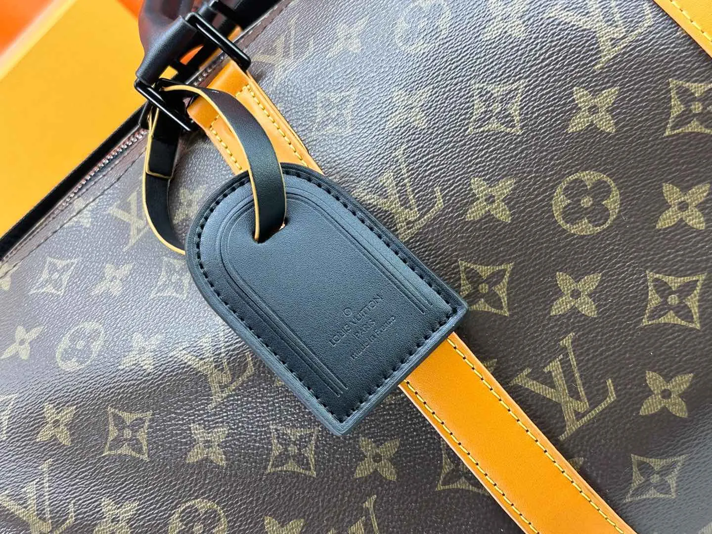 P360 M46703 M41416 This Keepall Bandoulière 45 travel bag introduces classic heritage in Monogram Macassar coated canvas. Side straps are cut out of contrasting leather, leather handles and hardware at the top add a calming touch, and the detachable and adjustable fabric shoulder strap is woven with the Louis Vuitton logo. Dimensions: 45 x 27 x 20 cm (Length x Height x Width) - Monogram Macassar coated canvas - Cow leather trim - Textile lining - Metal hardware - Carry-on baggage dimensions - Double zip closure - Padlock - Internal zip pocket - Removable name tag - Shoulder strap: removable, adjustable - Handles: Double handles - This product is made in one of France, Spain, Italy and the United States
