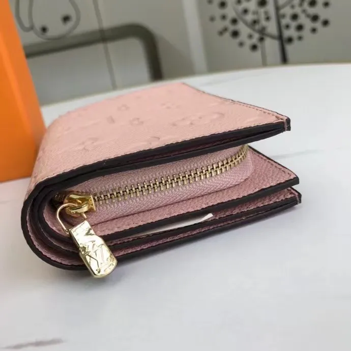 P150M80152 This Cléa wallet is made of Monogram Empreinte soft grained cowhide, embellished with Louis Vuitton's iconic Monogram embossed pattern. It has a stylish design, is exquisite and compact but has a spacious capacity. It is equipped with an external patch pocket, zipper coin pocket, banknote compartment and six credit card slots. Dimensions: 12 x 9 x 3.5 cm (length x height x width