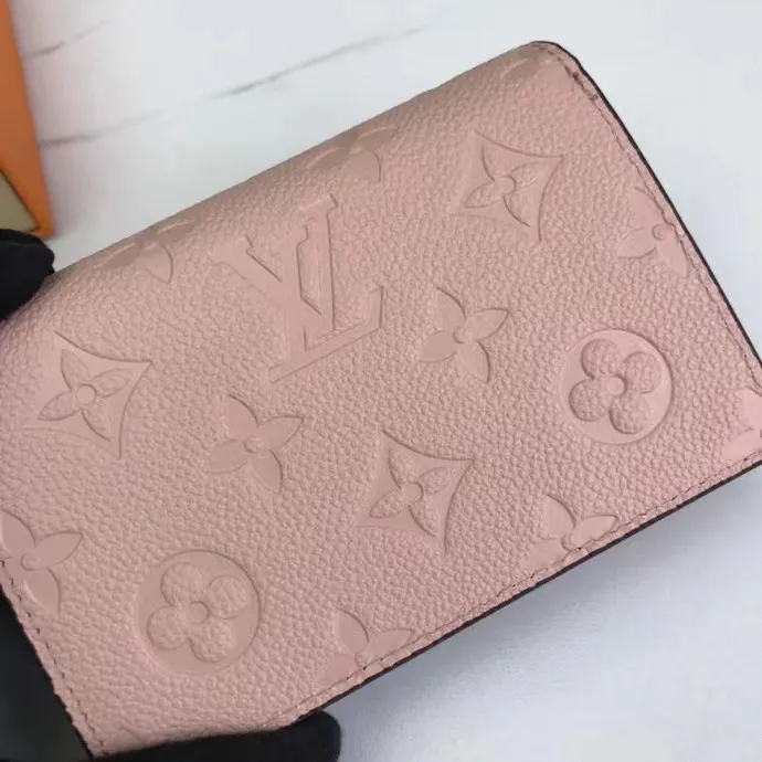 P150M80152 This Cléa wallet is made of Monogram Empreinte soft grained cowhide, embellished with Louis Vuitton's iconic Monogram embossed pattern. It has a stylish design, is exquisite and compact but has a spacious capacity. It is equipped with an external patch pocket, zipper coin pocket, banknote compartment and six credit card slots. Dimensions: 12 x 9 x 3.5 cm (length x height x width